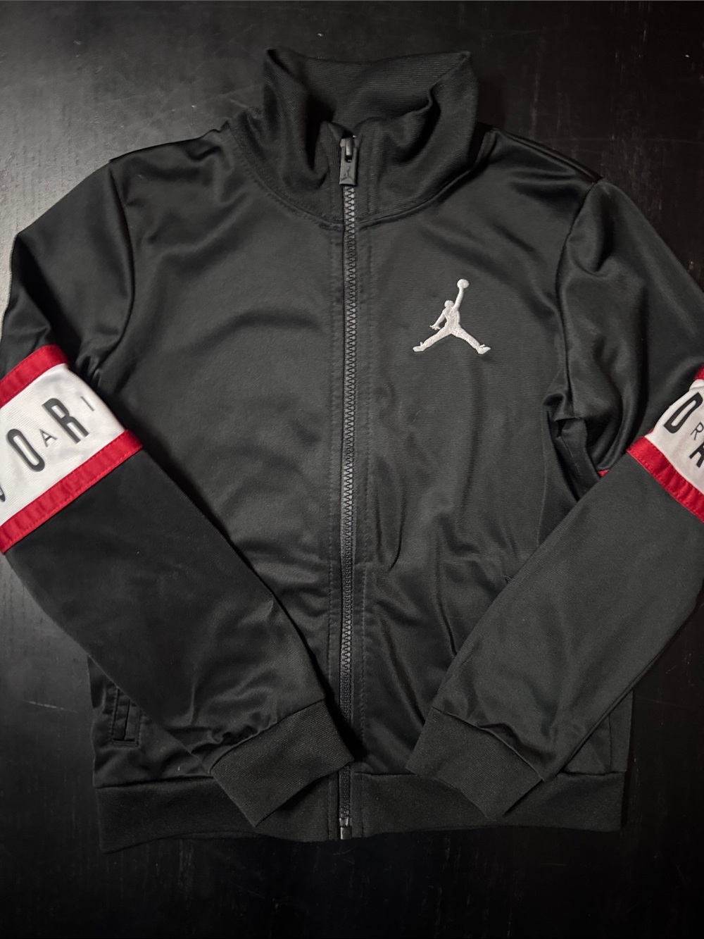 Jordan Men’s Black Track Jacket with Red Sleeve Stripes